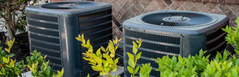 HVAC technician performing AC repair service in La Mesa CA home